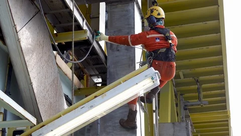 Working At Height Using Abseiling. Stock Footage 129646262