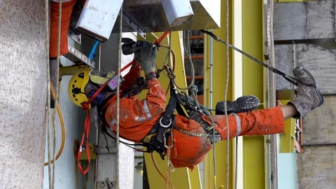 Working at Height Using Abseiling. Stock Footage 129697609