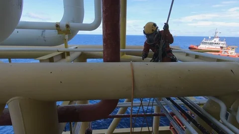 Working at height using abseiling technique. Stock Footage 99141927