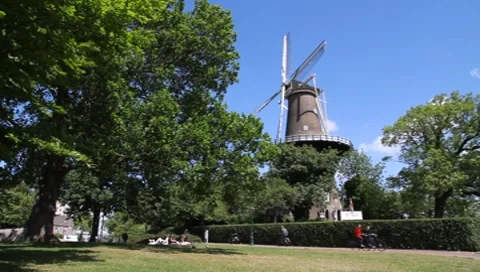 Working historic windmill Long shot Stock Footage 7504885