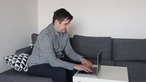 Working home, man typing on computer, freelancer Stock Footage 126671090