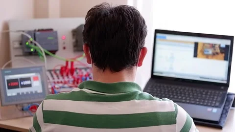 Working Home Office and Making Online Education about PLC Video stock 132880622