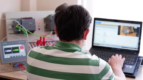 Working Home Office and Making Online Education about PLC Video stock 132880639