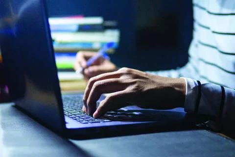 Working at home using digital tablets and pen. Busy working with laptop computer Stock Photos