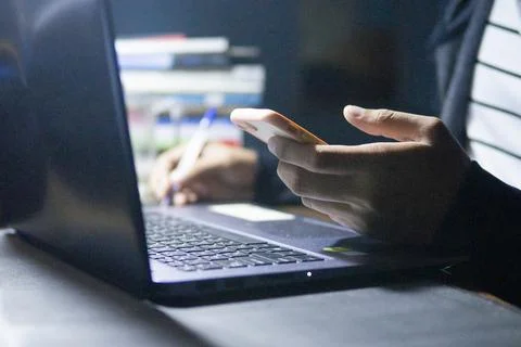 Working at home using digital tablets and mobile phones. Busy working with lapto Stock Photos