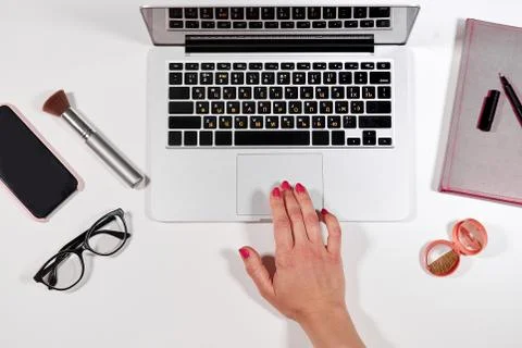 Working hours. secretary typing a document at work Stock Photos
