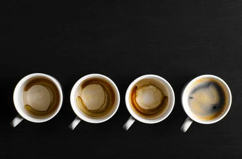 Working hours. working hours. empty and full cups of fresh espresso, view ... Stock Photos