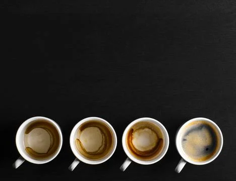 Working hours. working hours. empty and full cups of fresh espresso, view ... Stock Photos