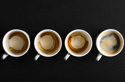 Working hours. working hours. empty and full cups of fresh espresso, view ... Stock Photos