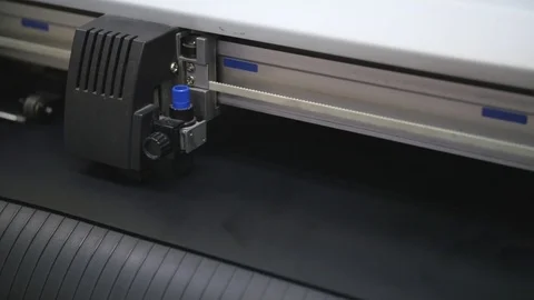 A working industrial printer cuts out Stock Footage 81047852
