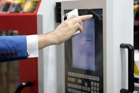 Working with industrial touch screen control panel Stock Photos