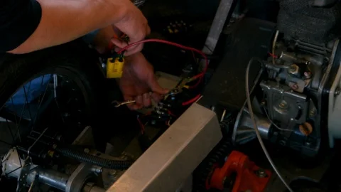 Working inside of an engine Stock Footage 112882141