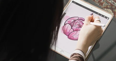 Working with interactive pen display. Drawing on a graphics tablet. close up Stock Footage 104087446