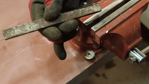 Working with an iron part. Processing of workpieces. Stock Footage 156174379