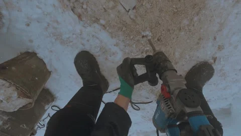 Working with a jackhammer, jackhammer Stock Footage 328875720