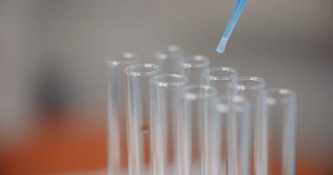 Working in Laboratory - Scientist Using Pipette in Lab. Video stock 127597660
