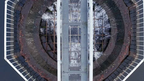 A working lake drain from above Stock Footage 145025719