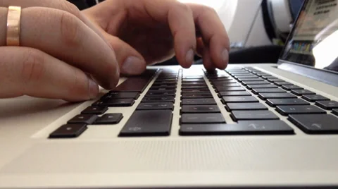 Working on laptop on airplane Stock Footage 36146954