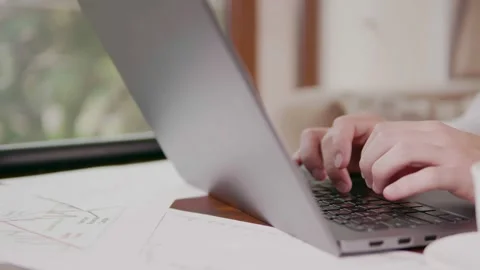 Working with a laptop and a cup of coffee Stock Footage 159901210