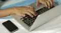 working with laptop on the bed in the morning - email - e-mail - mail HD Footage