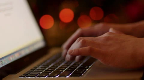 Working in Laptop by Christmas Tree Stock Footage 57748074