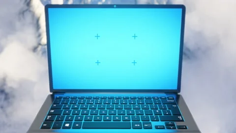 Working laptop computer is spinning above snowy mountains Stock Footage 150253041