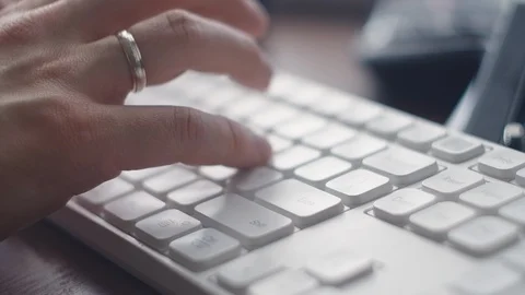 Working on laptop computer, typing on keyboard, modern office business. Men's Stock Footage 127021235