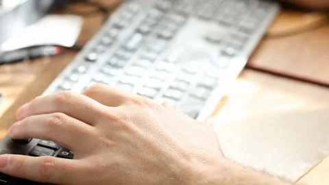 Working on laptop computer, typing on keyboard, modern office business Stock Footage 128223872