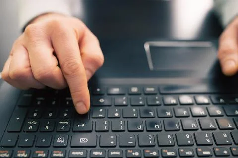 Working on laptop. Concept of using technology in communication. Stock Photos