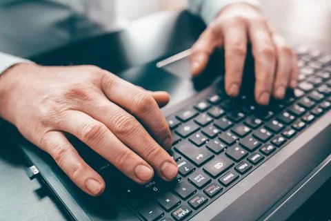 Working on laptop. Concept of using technology in communication. Stock Photos