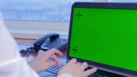 Working on the laptop with green screen Stock Footage 46595576