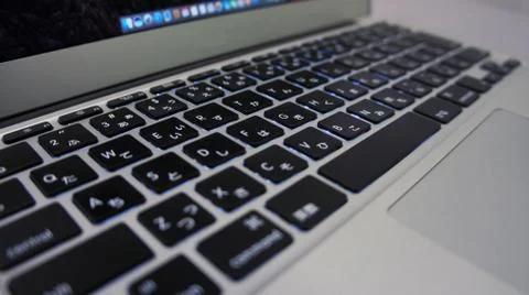 Working on laptop Keyboard angle Foto stock