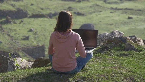 Working with a laptop outdoor Stock-Footage 75498543