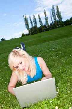 Working with a laptop in the park Stock Photos