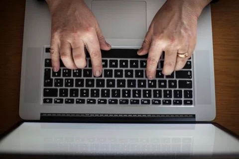 Working on laptop Stock Photos