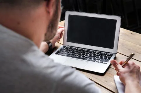 Working at a laptop Stock Photos