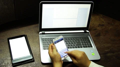 Working on laptop tablet smartphone Stock Footage 65502827