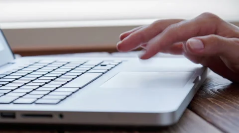 Working on laptop touchpad Stock Footage 52376563