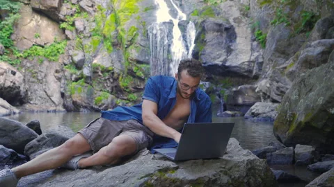Working On Laptop At The Waterfall In The Forest. Stock Footage 212526349