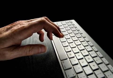 Working late on a computer. Stock Photos