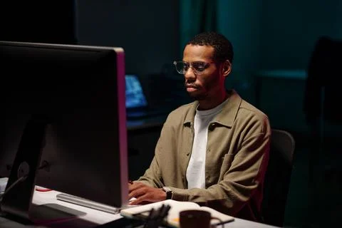 Working Late in Front of Computer Screen Stock Photos