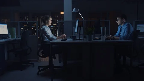 Working Late at Night in the Office: Workers Use Desktop Computers, Analyzing Stock Footage