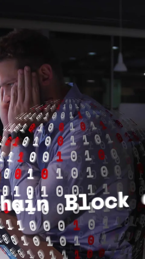 Working late in office, man surrounded by blockchain and binary code animation Stock-Footage 343091660