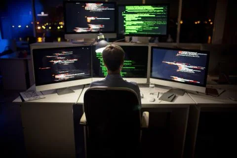 Working Late in Office Stock Photos