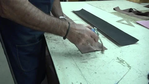 Working with Leather and Glue - 867 Stock Footage 308818150