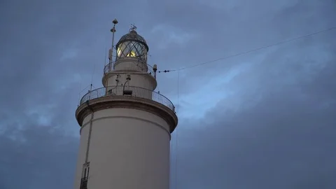 Working lighthouse in Malaga at the evening Stock Footage 83455956