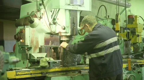 Working on machine Stock Footage 33402769
