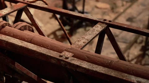 Working machinery in a construction area with rust and wear over time Vídeo Stock 337875265