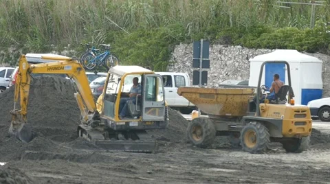 Working Machines on a Sandy Beach Video stock 54896033