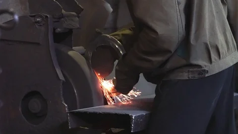 Working man with angle grinder, process of cutting carbonated steel metal with Video stock 83796609